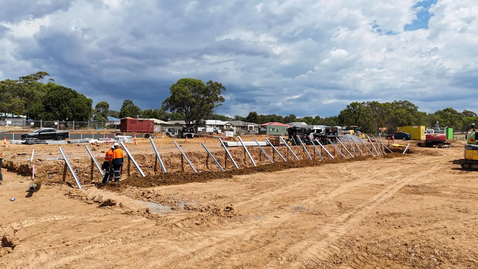 Large civil retaining wall installation in progress